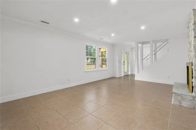 an empty room with windows