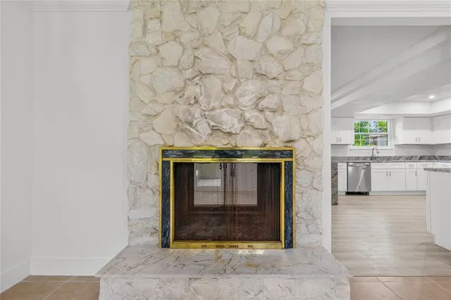 a living room with a fireplace