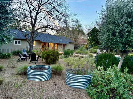 a garden view with a seating space