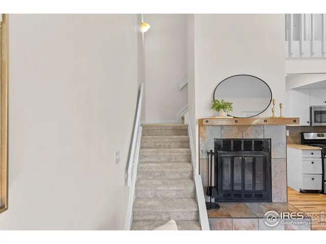 a view of fireplace and entryway