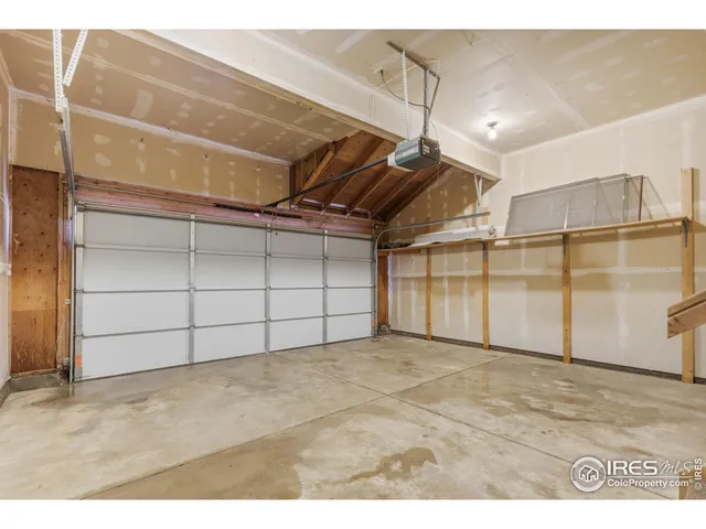 a view of a house with a garage