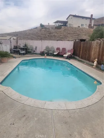 a view of a swimming pool and lake view