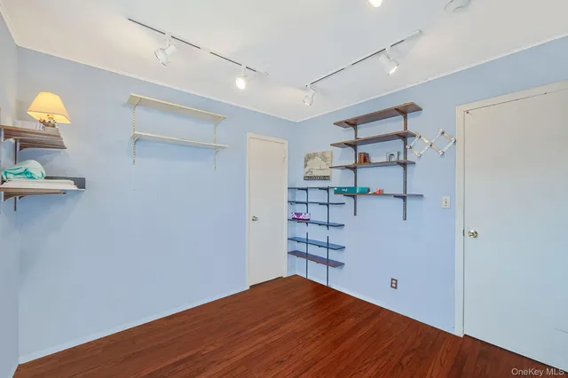 a view of empty room with empty racks