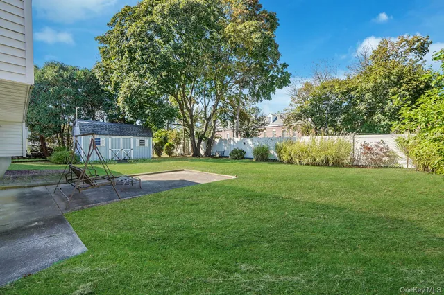 a view of a house with a big yard