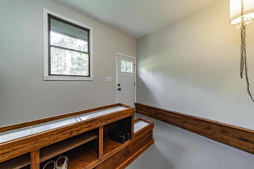 11 Clark Wright Road Middlefield, MA 01011 - Photo 11 of 30 a room with wooden floor and windows