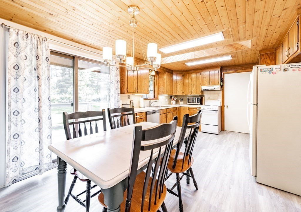 11 Clark Wright Road Middlefield, MA 01011 - Photo 13 of 30 a view of a dining room with furniture window and outside view