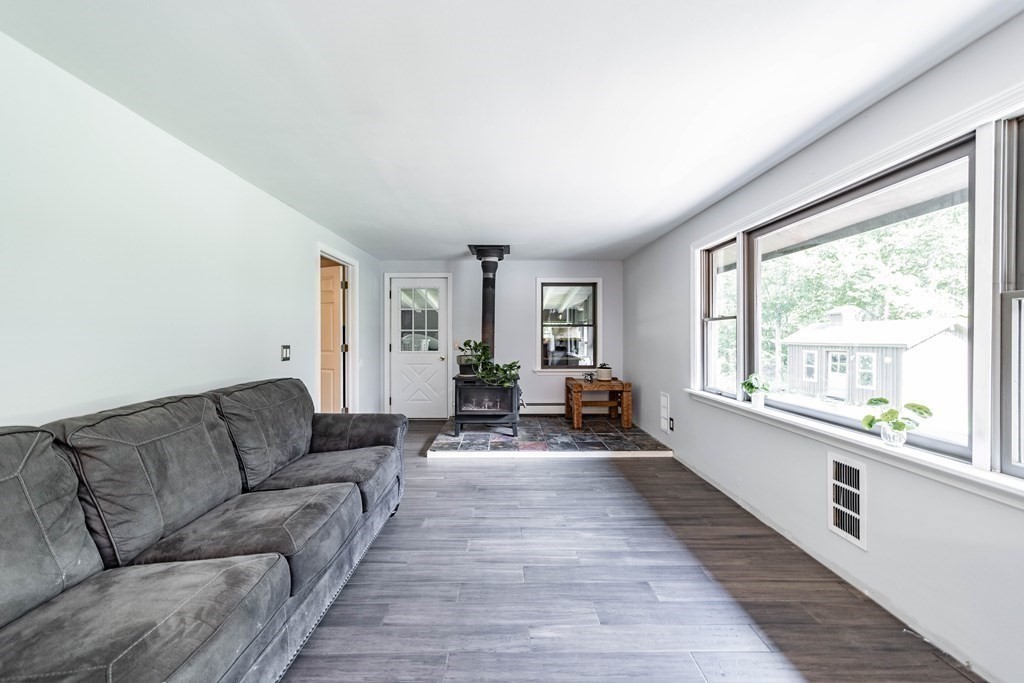 11 Clark Wright Road Middlefield, MA 01011 - Photo 15 of 30 a living room with furniture and a large window
