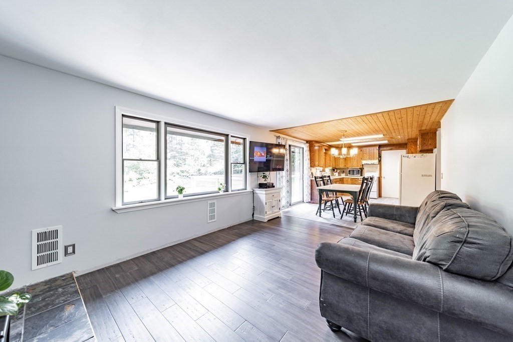 11 Clark Wright Road Middlefield, MA 01011 - Photo 17 of 30 a living room with furniture and a large window