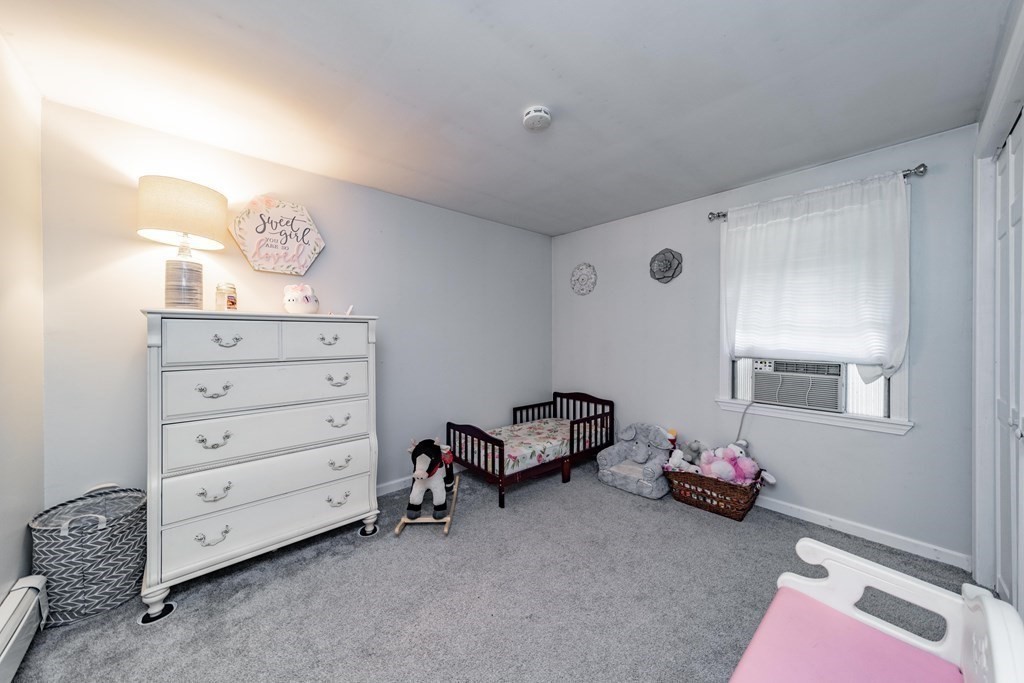 11 Clark Wright Road Middlefield, MA 01011 - Photo 18 of 30 a room with a baby crib furniture and dresser