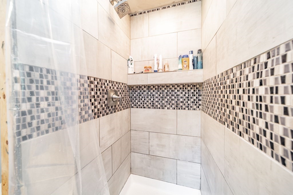 11 Clark Wright Road Middlefield, MA 01011 - Photo 19 of 30 a bathroom with a bathtub and shower