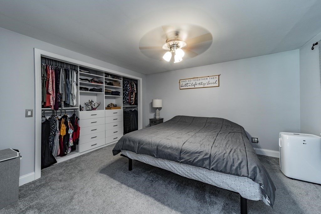 11 Clark Wright Road Middlefield, MA 01011 - Photo 20 of 30 a bedroom with a bed and a walk in closet