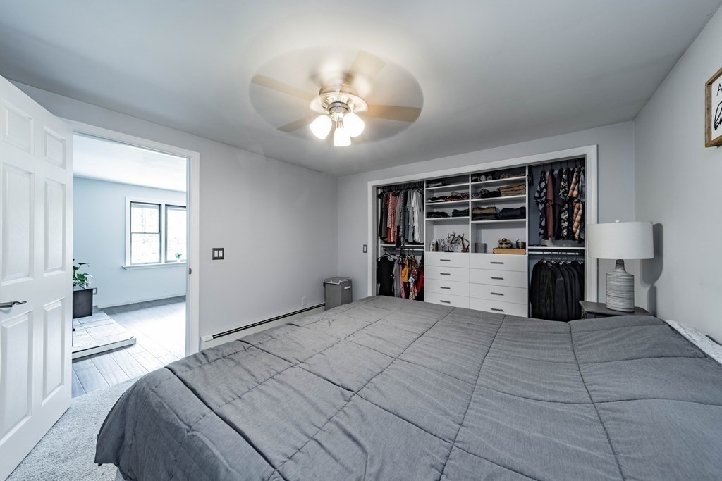 11 Clark Wright Road Middlefield, MA 01011 - Photo 22 of 30 a large white kitchen with a stove top oven and cabinets