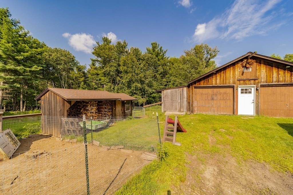 11 Clark Wright Road Middlefield, MA 01011 - Photo 4 of 30 a view of a house with backyard and sitting area
