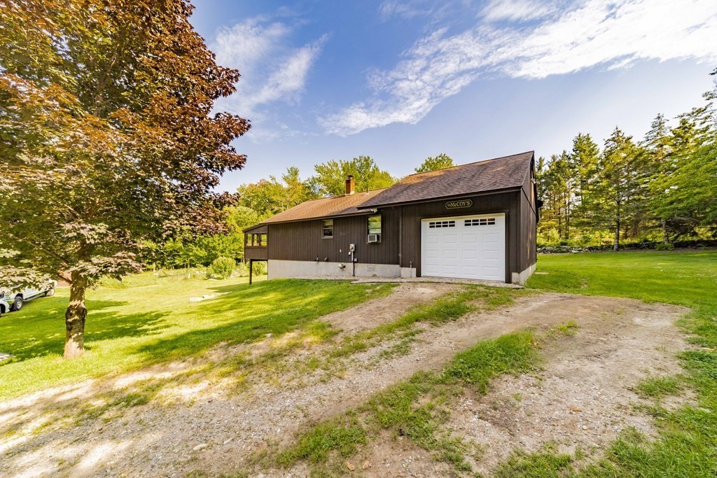 11 Clark Wright Road Middlefield, MA 01011 - Photo 5 of 30 a front view of a house with garden