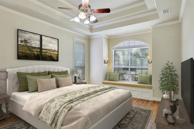 a bedroom with a large bed and a window