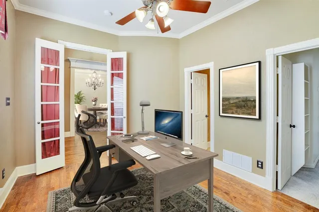 a workspace with furniture and window