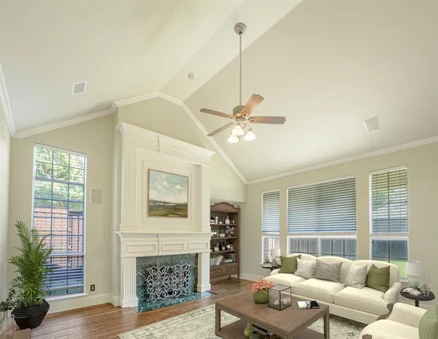 a living room with furniture and a fireplace