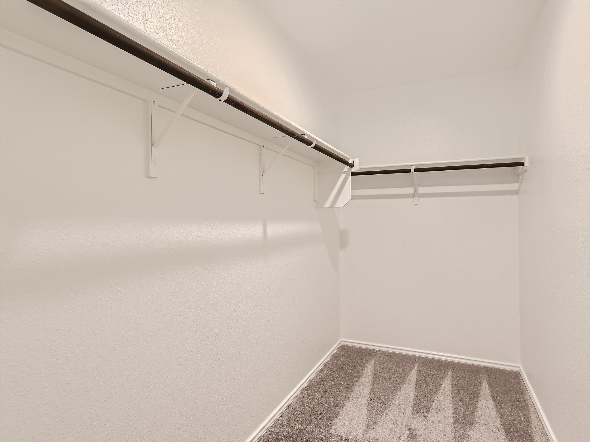 1513 Hope Rnch Road Leander, TX 78641 - Photo 22 of 28 20 2nd Floor Primary Bedroom Closet