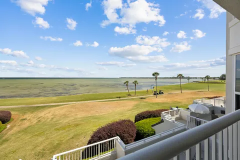 a view of a swimming pool with an ocean view