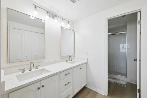 a bathroom with a shower and a toilet