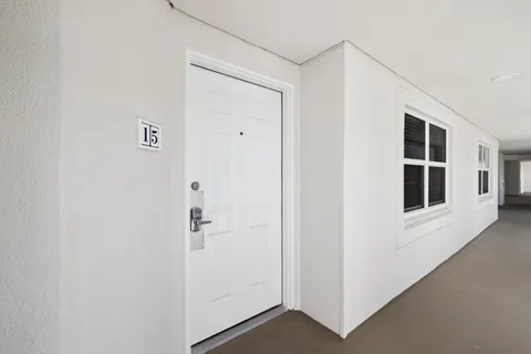 a view of a hallway with closet