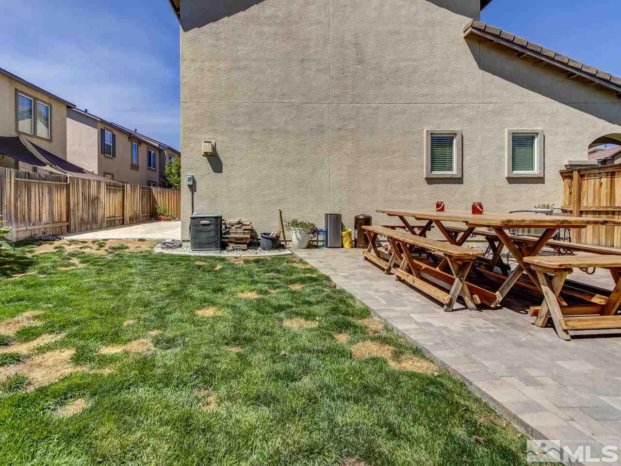 1990 Black Sand Drive Reno, NV 89521 - Photo 24 of 25 a view of a backyard with table and chairs