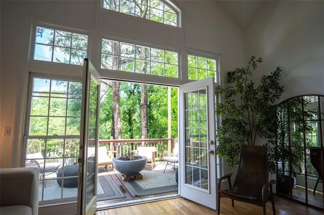 a living room with furniture and windows