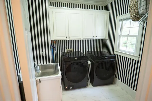 an entryway with a floor to ceiling window