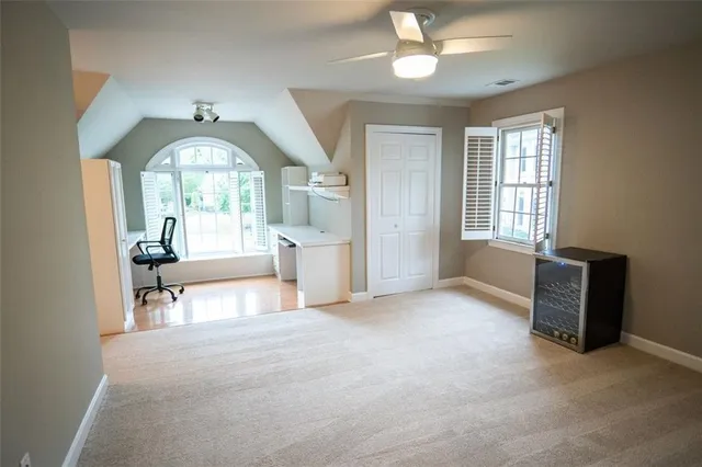 a view of a bathroom with a shower and a tub