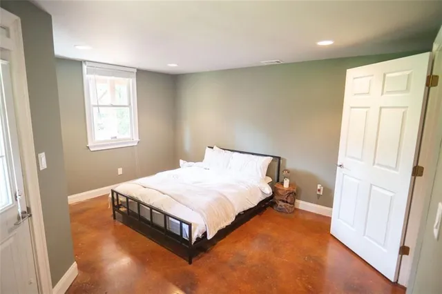 a view of room with a ceiling fan