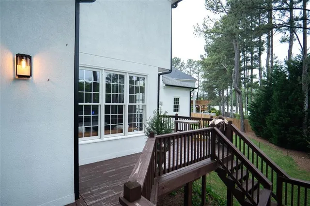 a view of a chairs on the roof deck
