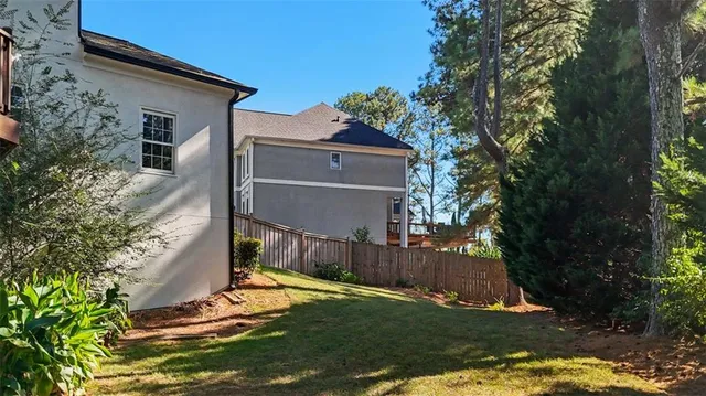 an aerial view of house with yard