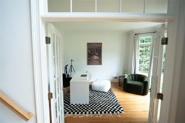 a living room with furniture and a window