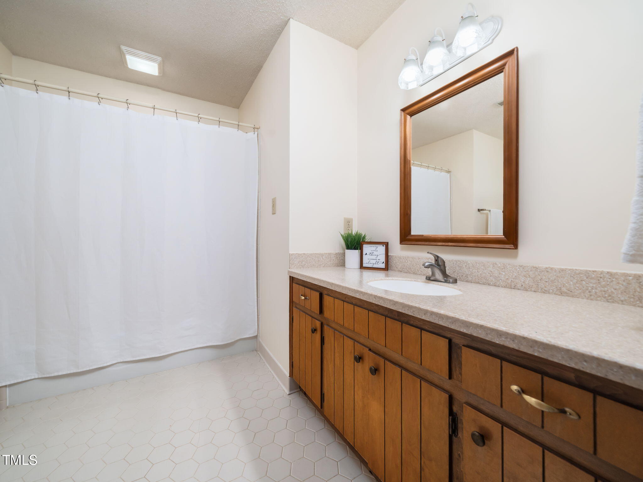 2610 Sawmill Road Raleigh, NC 27613 - Photo 14 of 25 Full Bath Upstairs