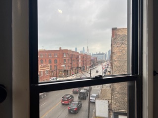 1215 West Grand Avenue, Unit 3F Chicago, IL 60642 - Photo 12 of 15 a view of a city from a window