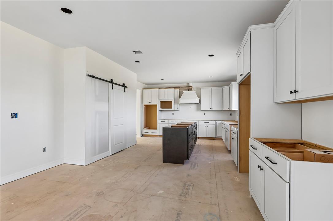3237 Michaels School Road, Unit 9 Nazareth, PA 18064 - Photo 15 of 56 Clean lines and a spacious layout define this kitchen during its final stages of construction.