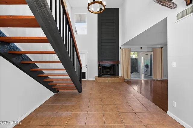 a living room with a fireplace