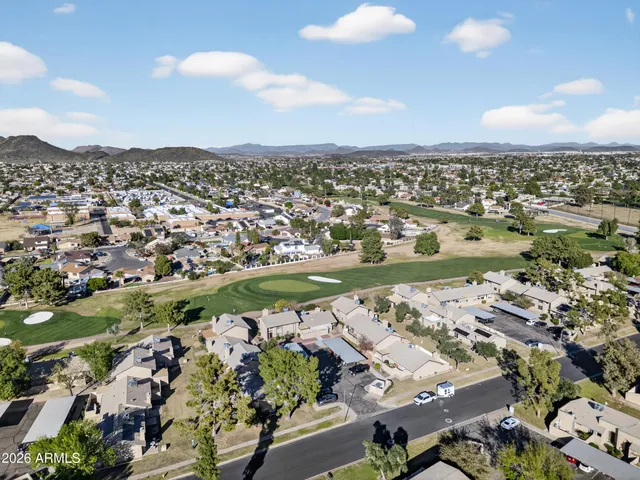 an aerial view of lake residential houses with outdoor space