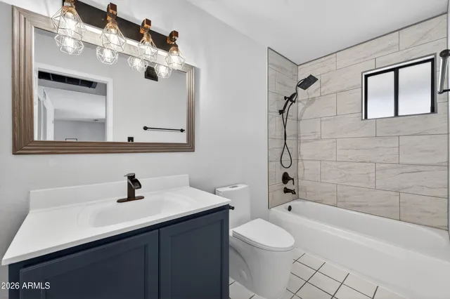 a view of wooden floor and windows in a room