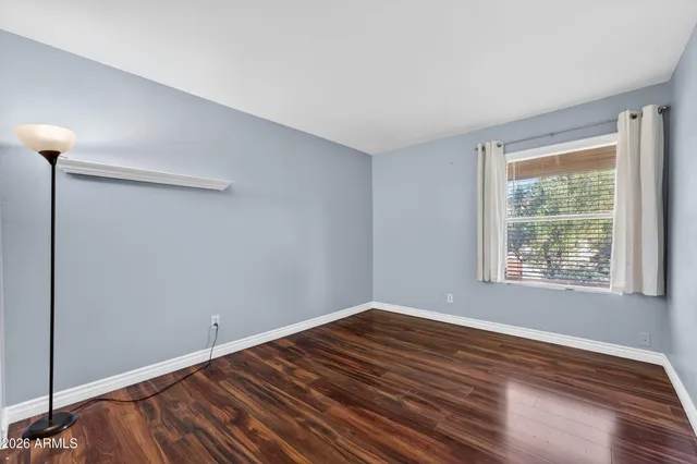 a view of a livingroom with wooden floor