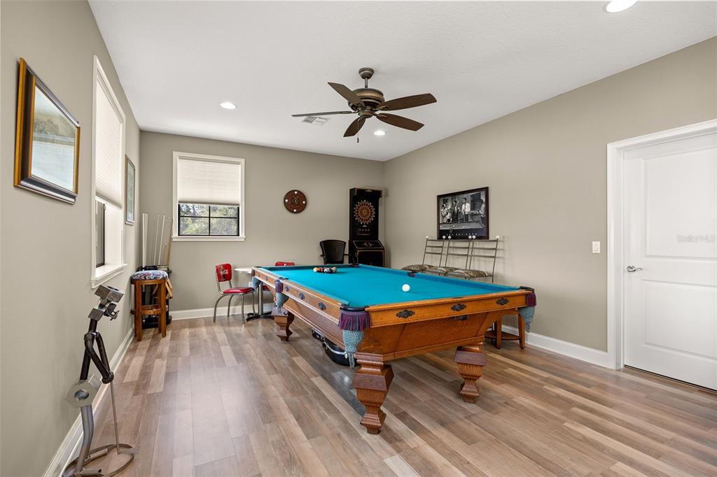 8692 Crested Eagle Place Sanford, FL 32771 - Photo 21 of 56 a room with pool table and windows