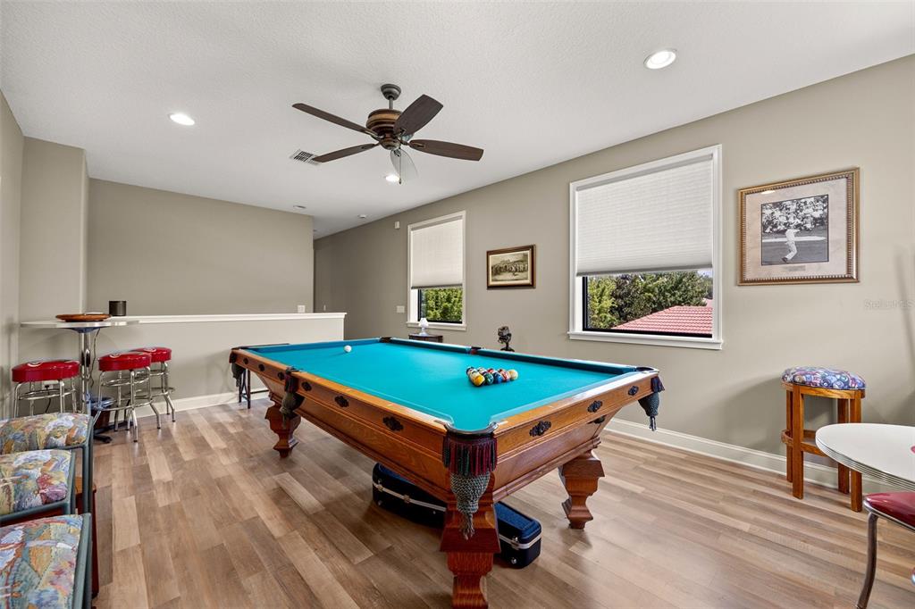 8692 Crested Eagle Place Sanford, FL 32771 - Photo 22 of 56 a room with furniture and pool table