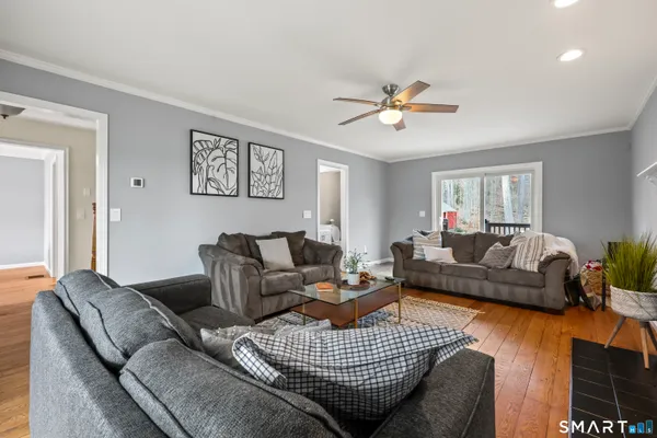 a kitchen with stainless steel appliances granite countertop a stove microwave and sink