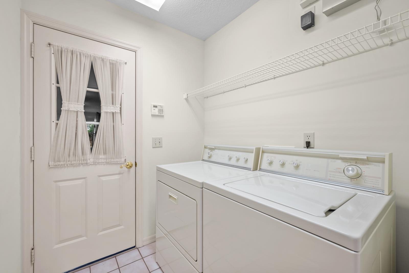 512 Moultrie Wells Road St. Augustine, FL 32086 - Photo 29 of 51 a utility room with dryer and washer