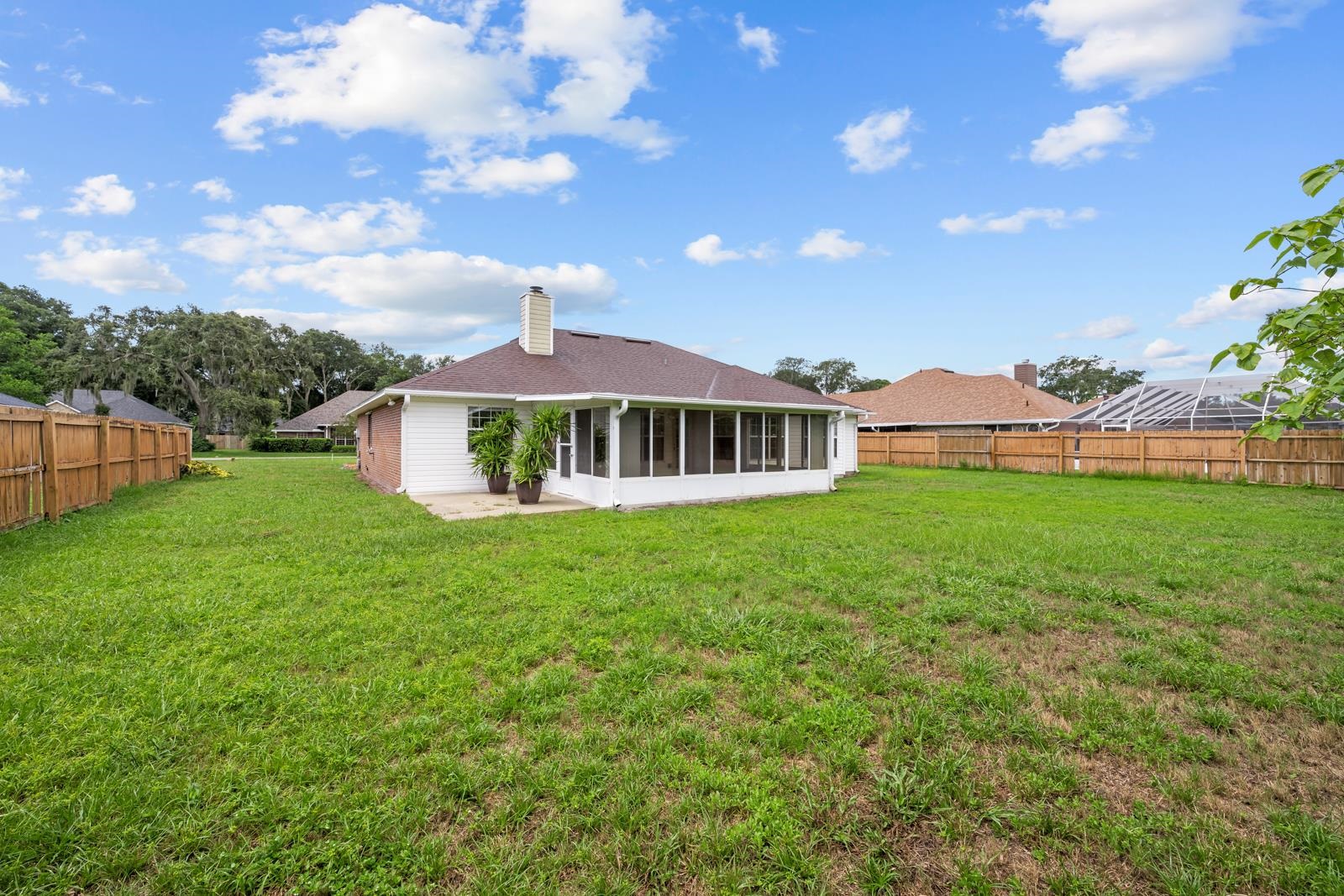 512 Moultrie Wells Road St. Augustine, FL 32086 - Photo 34 of 51 a view of a house with a yard
