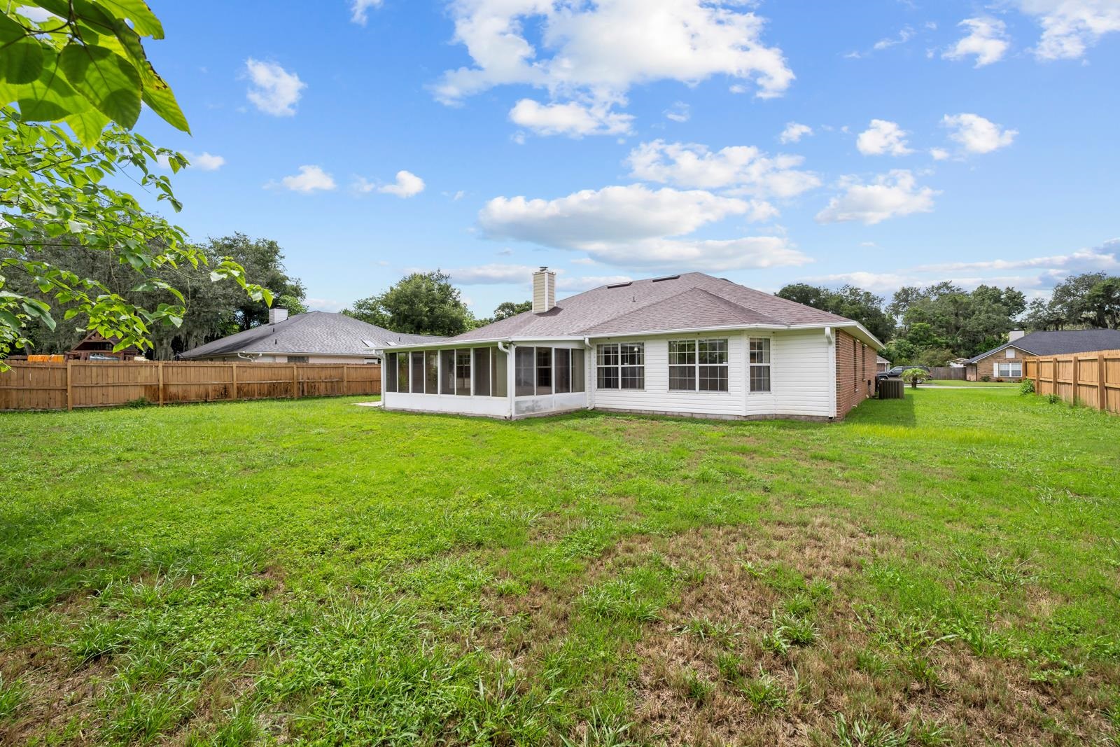 512 Moultrie Wells Road St. Augustine, FL 32086 - Photo 35 of 51 a front view of house with yard and green space