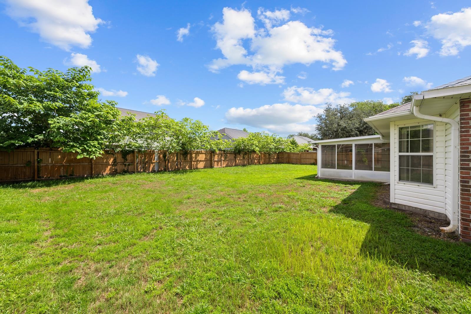 512 Moultrie Wells Road St. Augustine, FL 32086 - Photo 36 of 51 a view of house with backyard