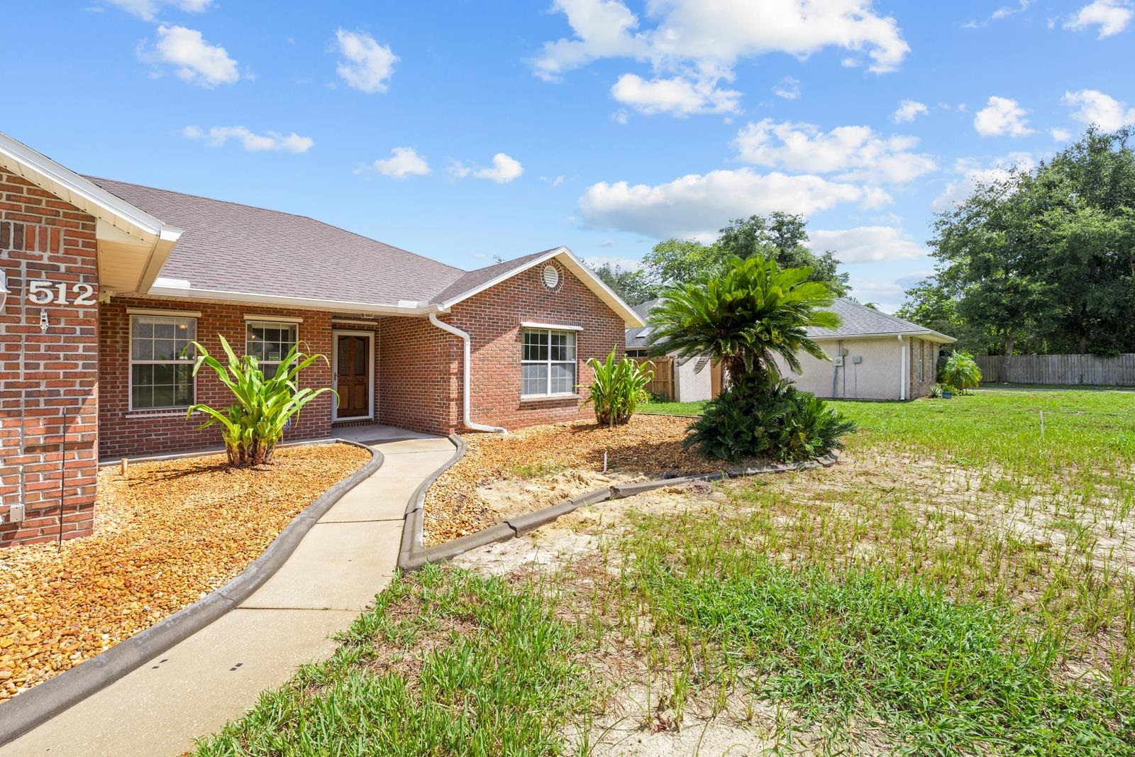 512 Moultrie Wells Road St. Augustine, FL 32086 - Photo 4 of 51 a view of a house with a patio