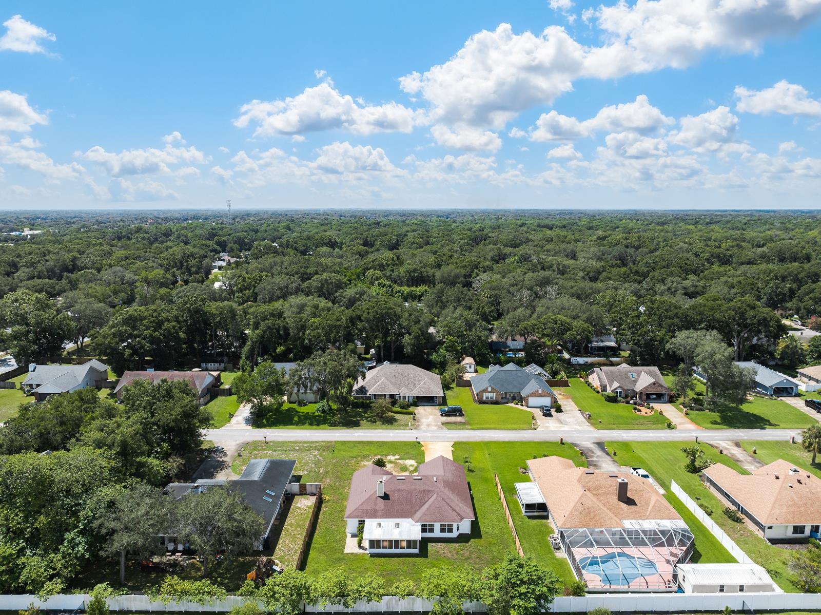 512 Moultrie Wells Road St. Augustine, FL 32086 - Photo 43 of 51 an aerial view of a swimming pool yard and outdoor seating