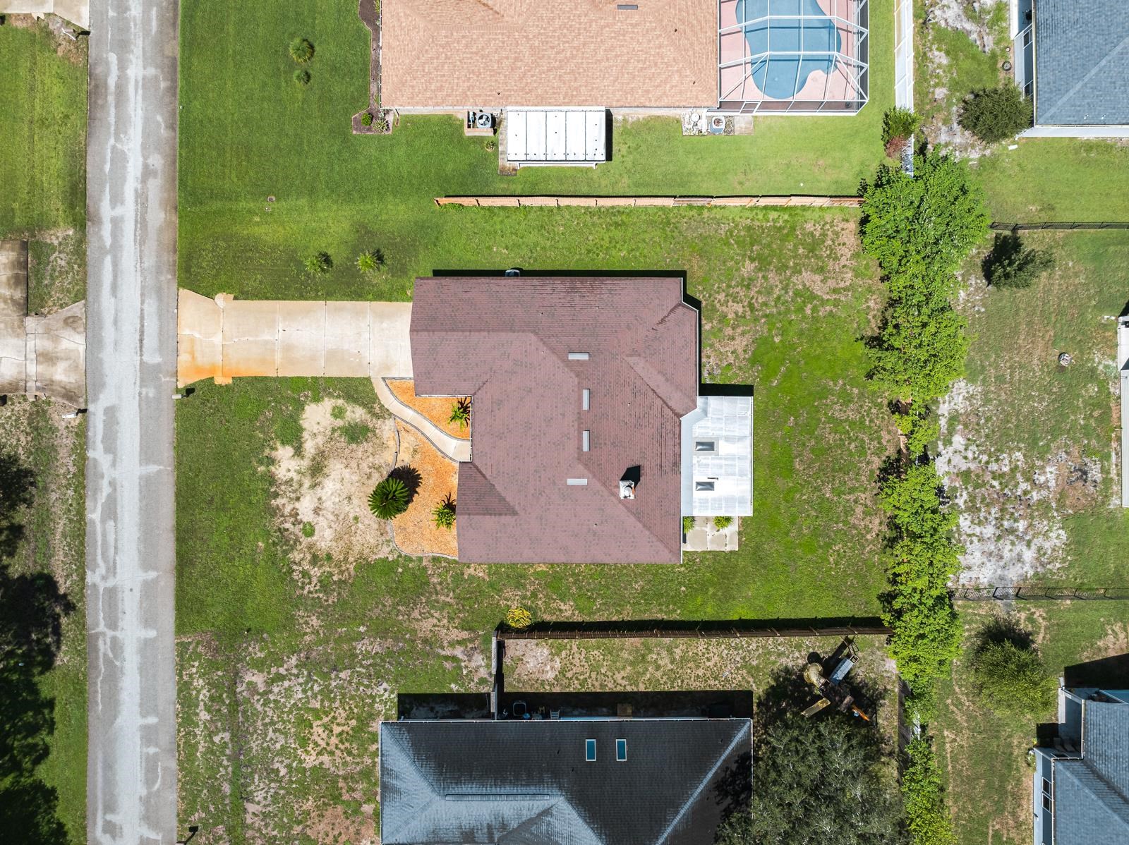 512 Moultrie Wells Road St. Augustine, FL 32086 - Photo 50 of 51 an aerial view of a house with a yard